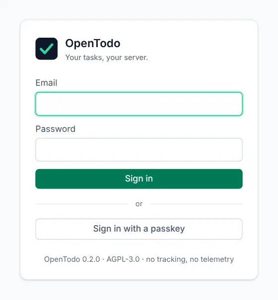 The sign-in screen with email and password fields and a Sign in with a passkey button below.